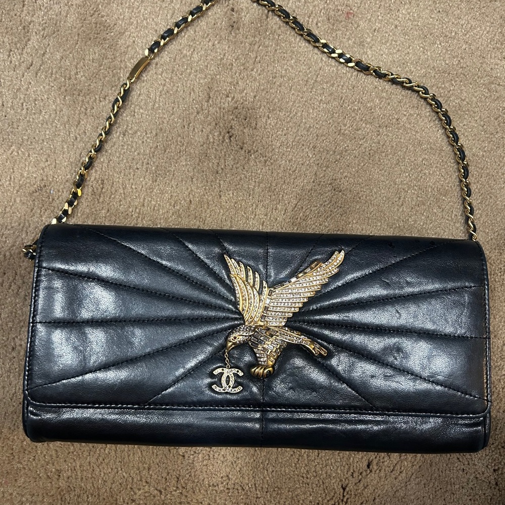 CHANEL Black and Gold Quilted Clutch with Chain Strap